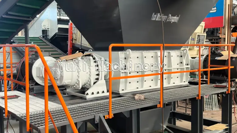 Various scrap materials ready for shredding: A/C Radiators, Aluminum Scrap, Metallic Drums, and Medical Blister waste.