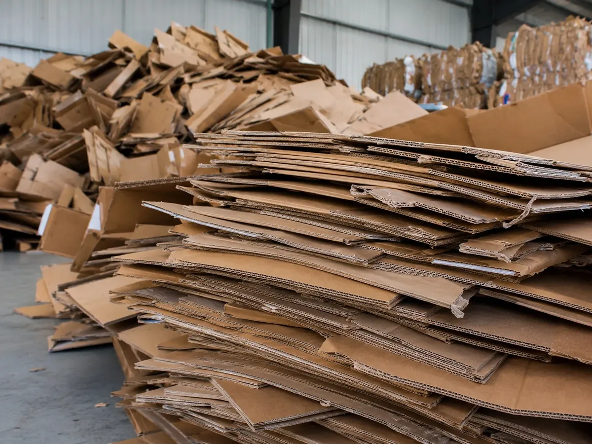 Baled waste paper for recycling line