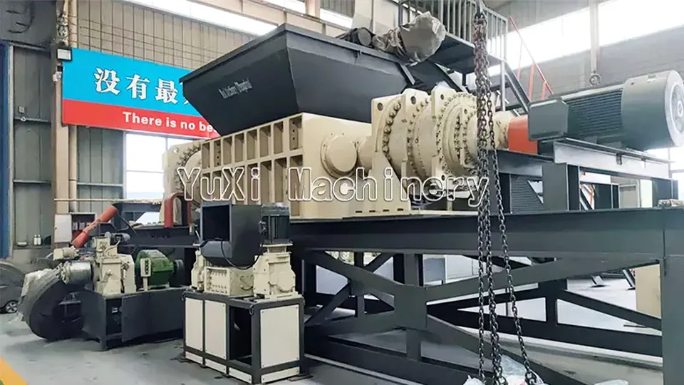 Industrial shredder used to open and downsize baled UBC